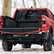 Illustration for article titled The 2019 Ram 1500 Gets a Wacky Asymmetrically Split Swing-Away Tailgate